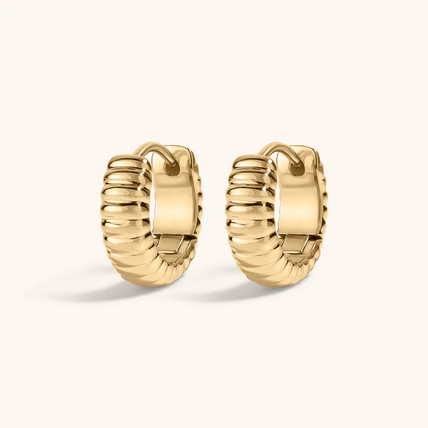 Plisse Huggie Hoops in Titanium