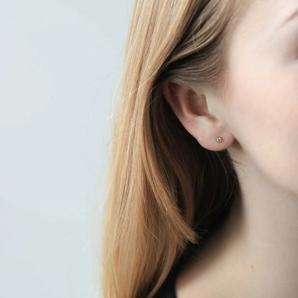 Tiny Diamond Studs in 14k Gold - Image 4